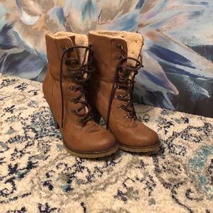 Faux Sherpa, lace up high heeled boots. Size 8.5
